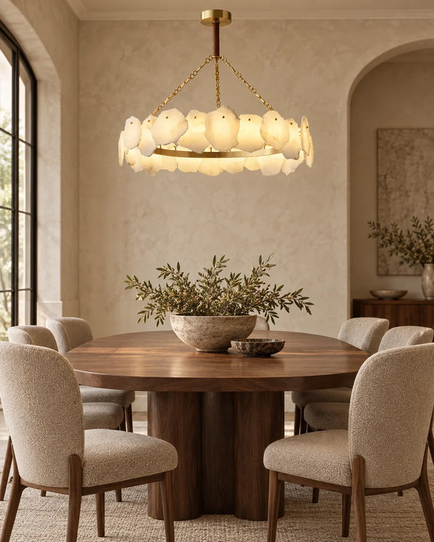 Sculptural alabaster chandelier above a walnut dining table — AUVIELIGHT