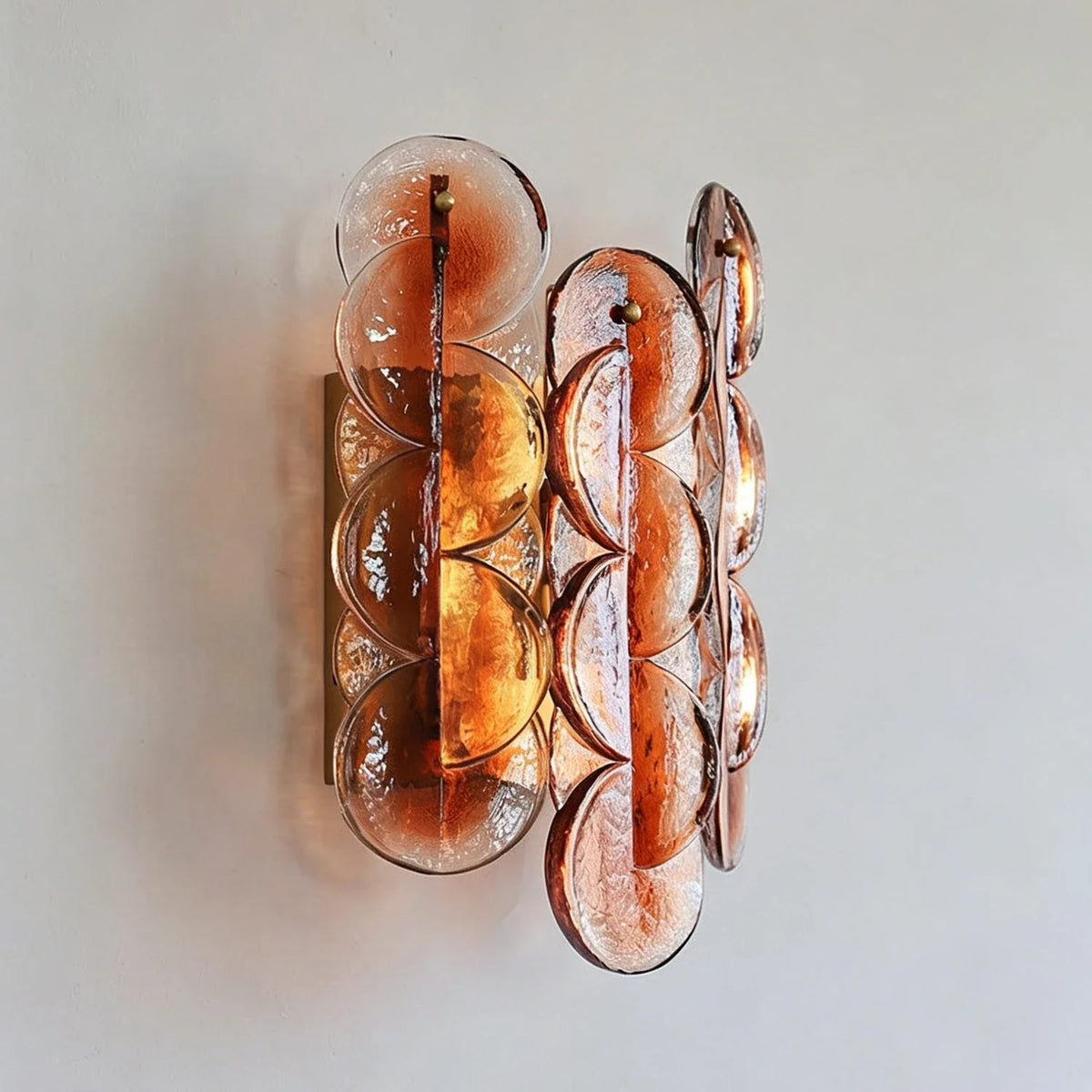 Interlocking Disc Wall Sconce in amber for Hallway by AUVIELIGHT