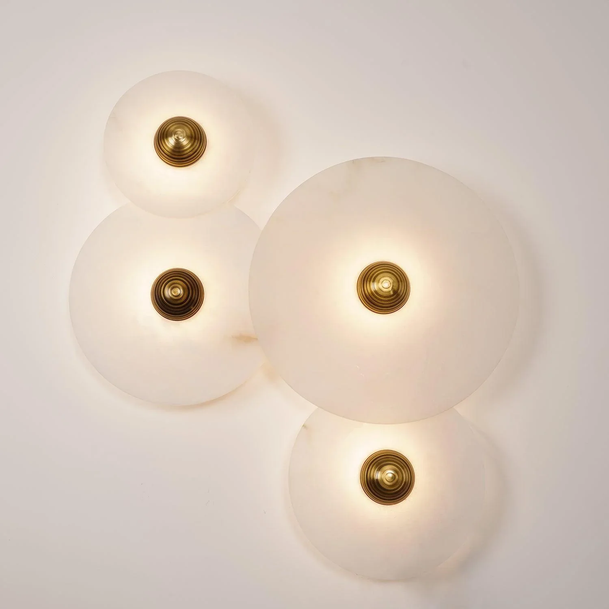 Solaris Disc Wall Light in alabaster for Hallway by AUVIELIGHT