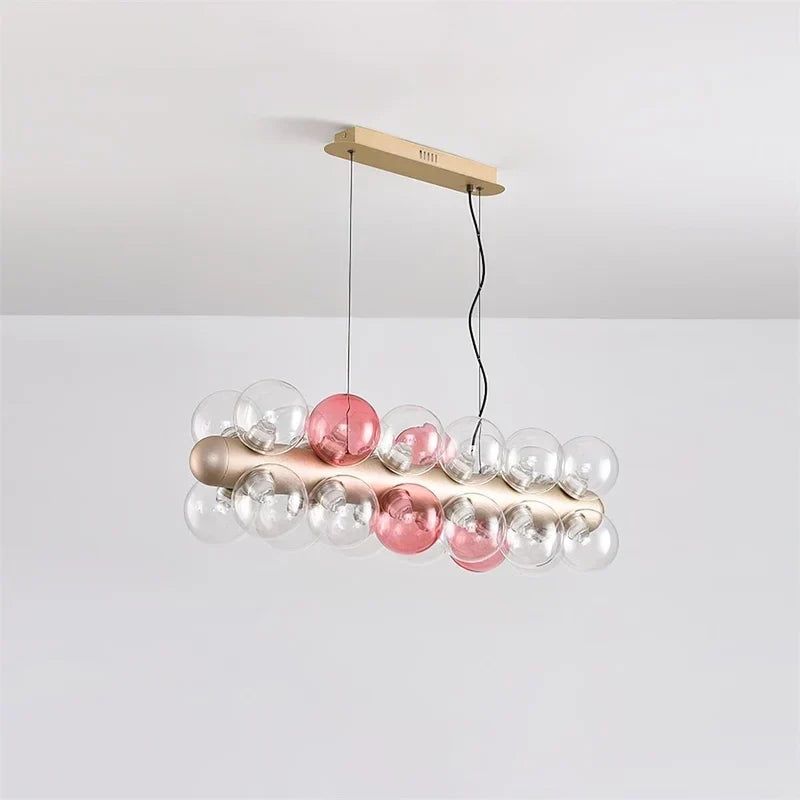 Modern Linear Globe Chandelier in glass for Dining Room by AUVIELIGHT, L 90cm x H 26cm / L 35.4" x H 10.2" / Pink & Clear / Warm White
