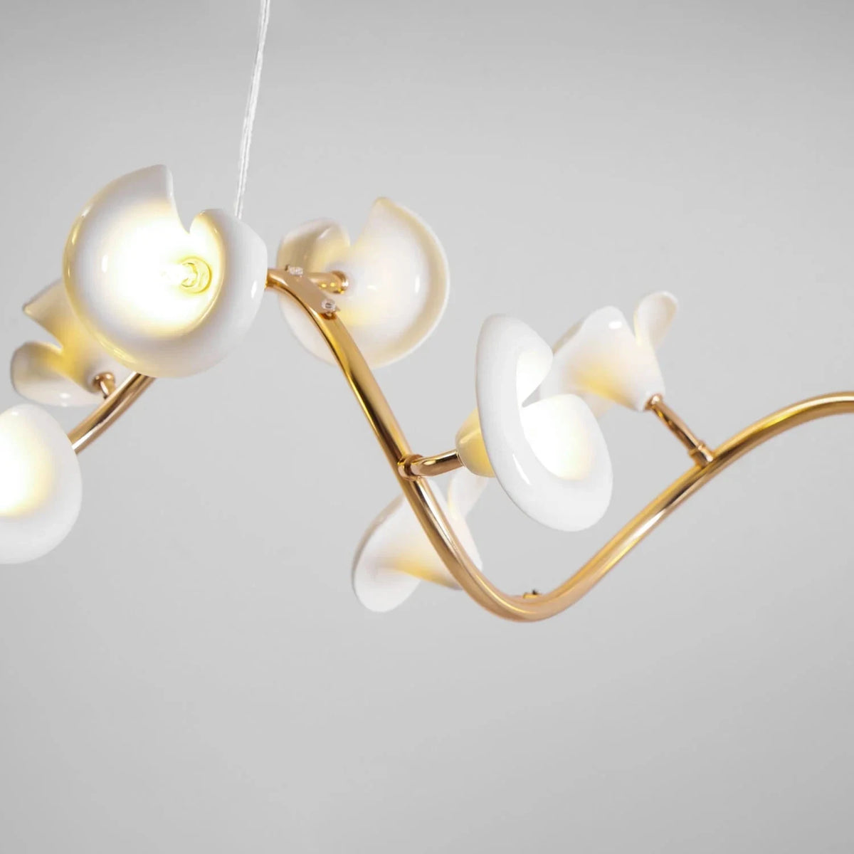 Elegant Brass S-Curved Glass Lily Pad Island Fixture light fixture by AUVIELIGHT